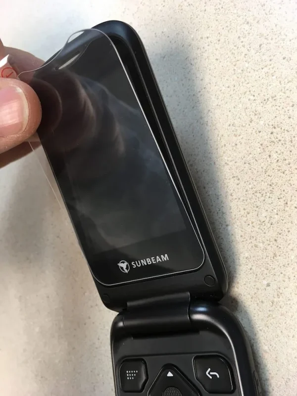 Applying the inner screen protector for F1 Pro flip phones, image 1.
