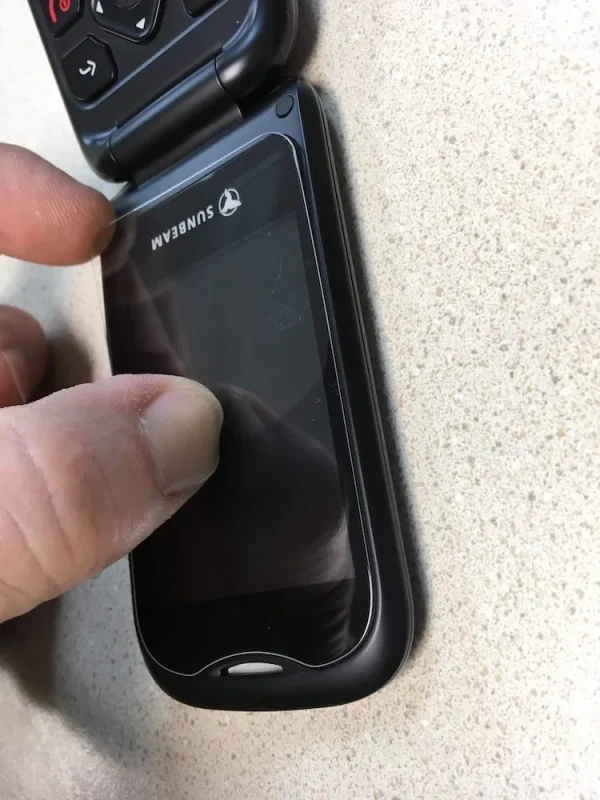 Applying the inner screen protector for F1 Pro flip phones, image 2.