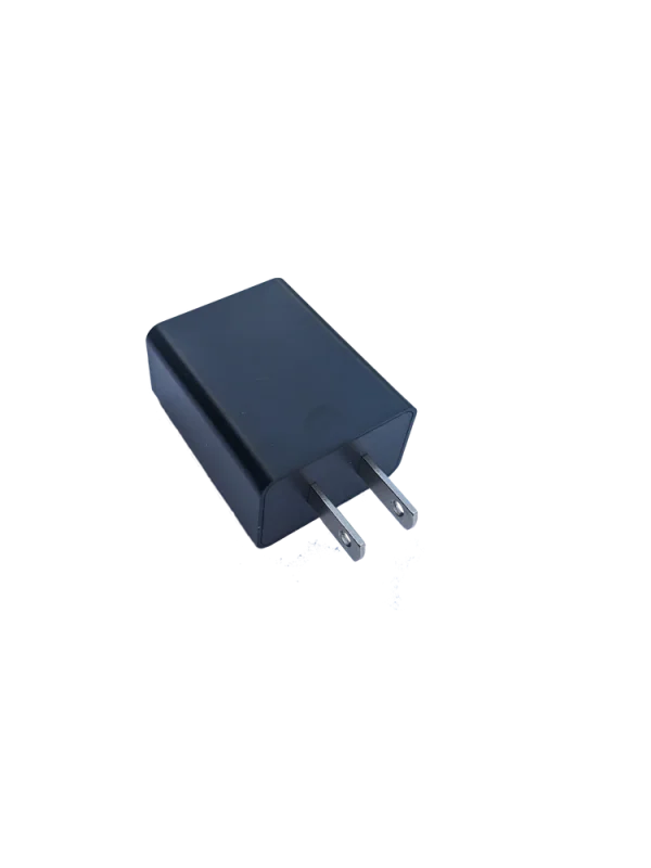 Prong side of the replacement charging adapter for F1 Horizon and Pro flip phones.